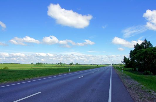 Landscape with road and the cloudy sky