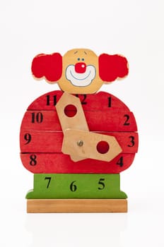 Toddler clown clock made ??of wood pieces