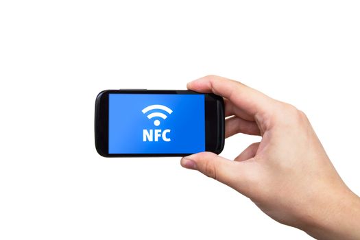 Hand holding smartphone with NFC technology - near field communication payment method