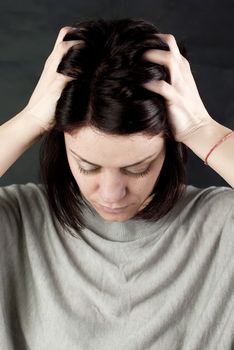 conceptual portrait of stressed abused young woman 