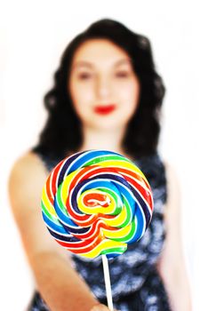 beautiful retro girls portrait with colorful lollipop