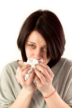 sneezing woman holding tissues, allergy or cold flu concept