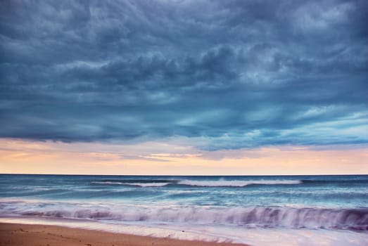 on the beach before a powerful storm 