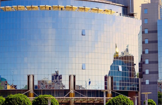 mirrored facade of an office building