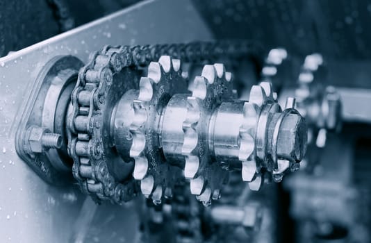 large gear-machinery being powerd by strong timing-chain