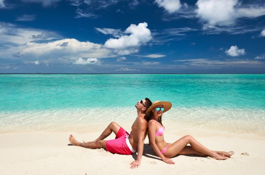 Couple on a tropical beach at Maldives