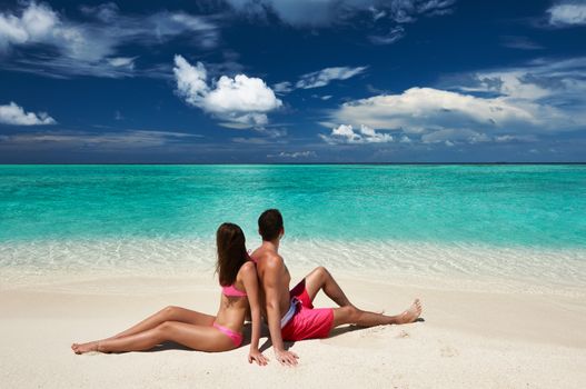 Couple on a tropical beach at Maldives