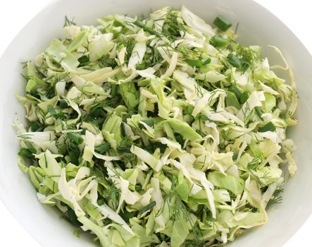 Summer coleslaw and greens isolated on white    