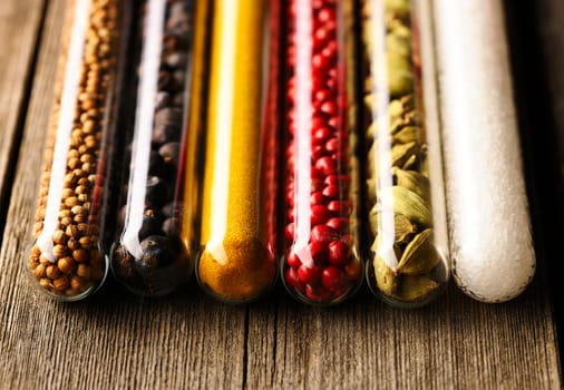 Spices in beakers close up