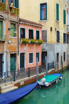 Beautiful romantic Venetian scenery. Street, canal, bridge. Venice. Italy