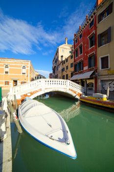 Beautiful romantic Venetian scenery. Street, canal, bridge. Venice. Italy