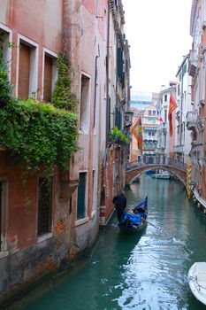 Beautiful romantic Venetian scenery. Street, canal, bridge. Venice. Italy