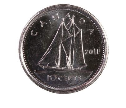 A brand new 2011 shiny Canadian ten cents coin with the Bluebird sailboat