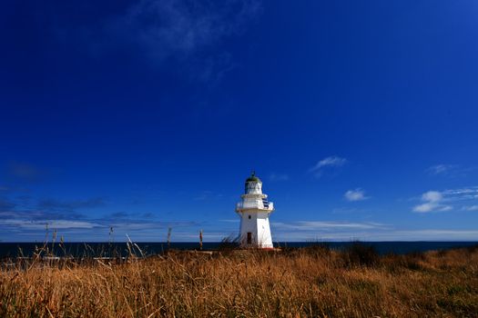 Beautifully restored heritage building of Waipapa Point Lighthouse on The Catlins coast on South Island of New Zealand