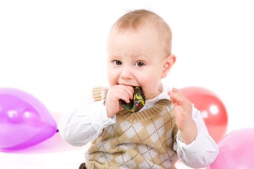 small child with ballooons