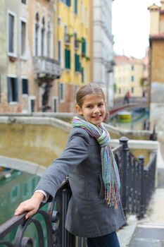 Summer venetian view and tourist girl. Venice, Italy.