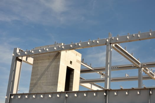 Concrete and steel building frame