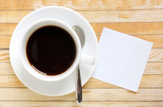 Blank paper with hot coffee cup