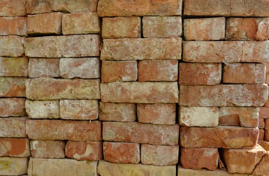 stacked red bricks on each other