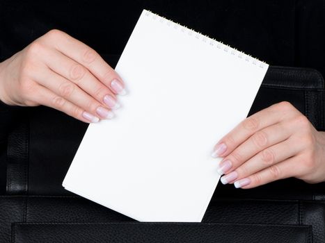 Well-groomed female hands and the varnished nails