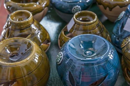 ceramic pots in many colors and shapes