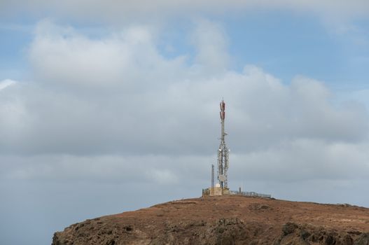 Telecommunications antenna on top of the mountain