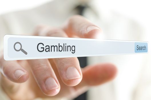 Word Gambling written in search bar on virtual screen.