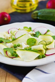 Zucchini ribbon with Pea ,Mint and Feta salad