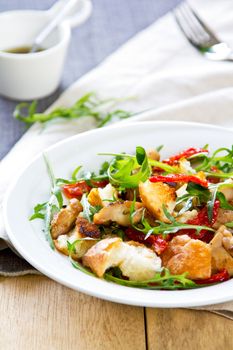 Chicken with sun dried tomato ,rocket and crouton salad