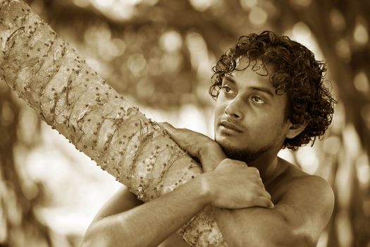 Portrait young men on a green background. Sri Lanka