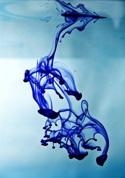 blue ink in blue water