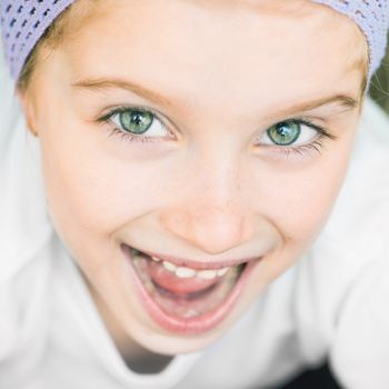Closeup Portrait of smiling beautiful little girl
