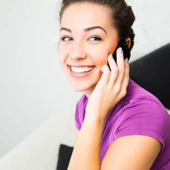 Attractive girl woman speaking by her cell phone