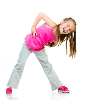 young girl gymnast isolated on a white background