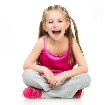 Smiling Little girl gymnast in studio on a white background