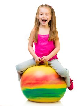 young girl doing gymnastics with ball over white background