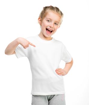 Smiling little girl in white t-shirt over white background