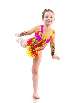 smiling little girl gymnast on a white background