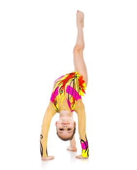 little girl gymnast standing on hands on a white background