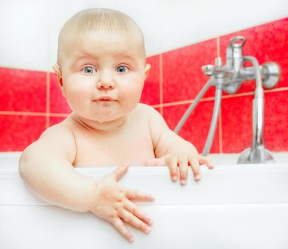 funny smiling baby in bath