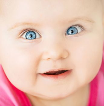 bright closeup portrait of cute baby