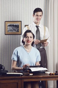Business partners smiling in an office, vintage style