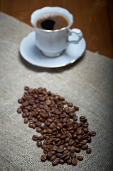 Coffee cup coffee beans background
