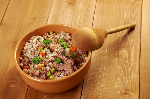 Russian Buckwheat porridge  vegetables und beef closeup