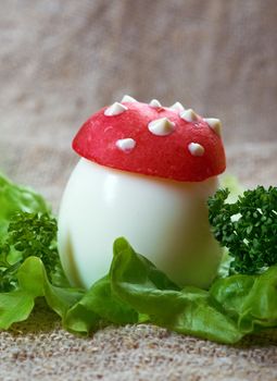 breakfast for child. mushrooms made from boiled egg ,small radish