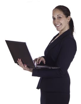 Smiling business woman working on a laptop computer