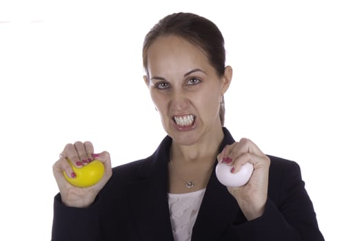 Angry business woman with stress balls