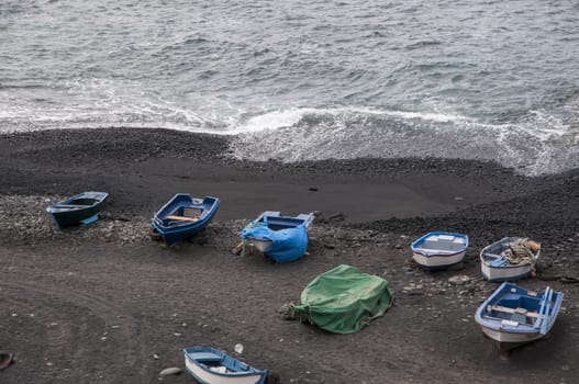 Lanzarote beach full of boats of all colors