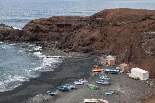 Lanzarote beach full of boats of all colors