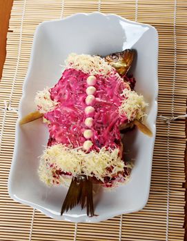 traditional russian salad with salted herring and beet -Selyodka Pod Shuboy (Dressed Herring)
